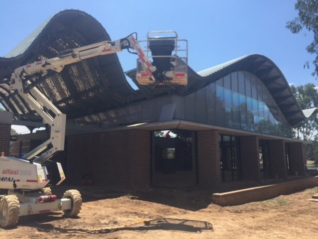 Wavebar Insulates Neighbourhood Centre Curvy Roof